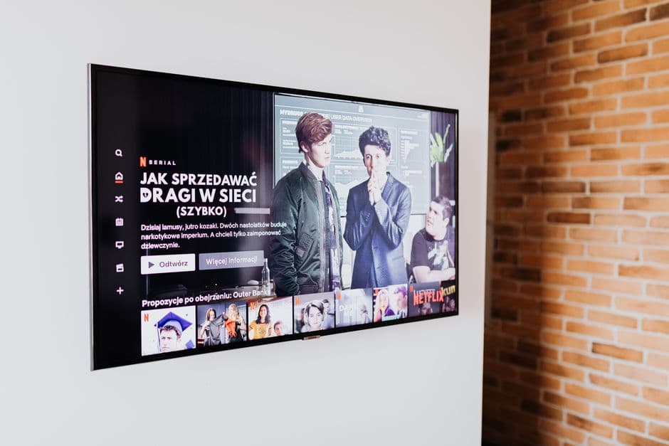 A flat-screen television on a white wall