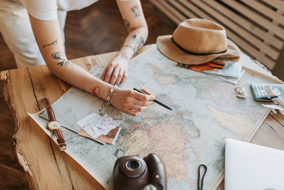A person studying a world map