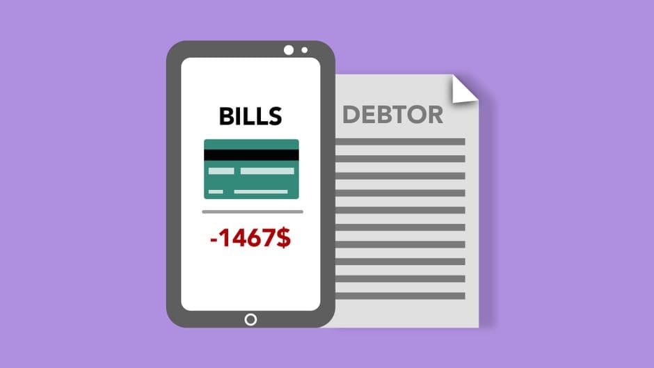 A card resting on a smartphone beside paperwork